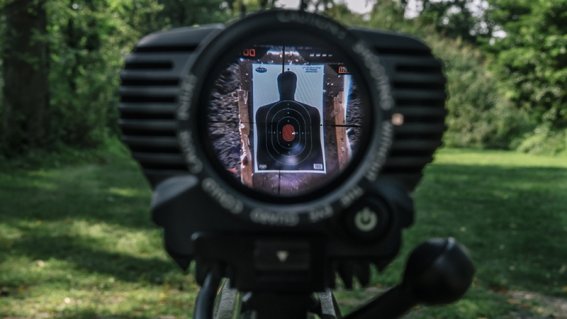 A view through the scope of the Tracking Point TP750 shows the white dot which can be set so the rifle doesn't fire until it is in the crosshairs again.