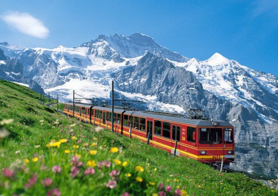 JUNGFRAUBAHN - Die Jungfraubahn vor der Jungfrau.

JUNGFRAU RAILWAY - The Jungfrau Railway and the Jungfrau peak.

Copyright by Jungfrau Railways     By-line swiss-image.ch