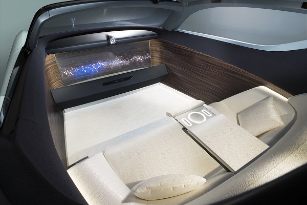 passengers-can-sit-back-and-watch-a-show-on-a-giant-oled-screen-that-takes-up-the-entire-wall-of-the-front-cabin