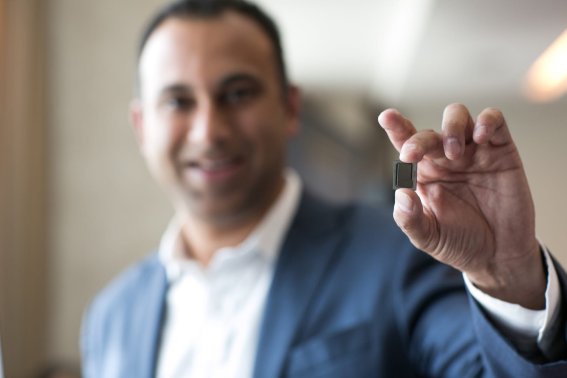 Navin Shenoy, Intel corporate vice president and general manager for its Client Computing Group, holds a 7th Gen Intel Core processor. 7th Gen Intel Core processors deliver richer experiences, incredible performance and responsiveness, and true ultra HD 4K entertainment in stunning new devices. (Credit: Intel Corporation)