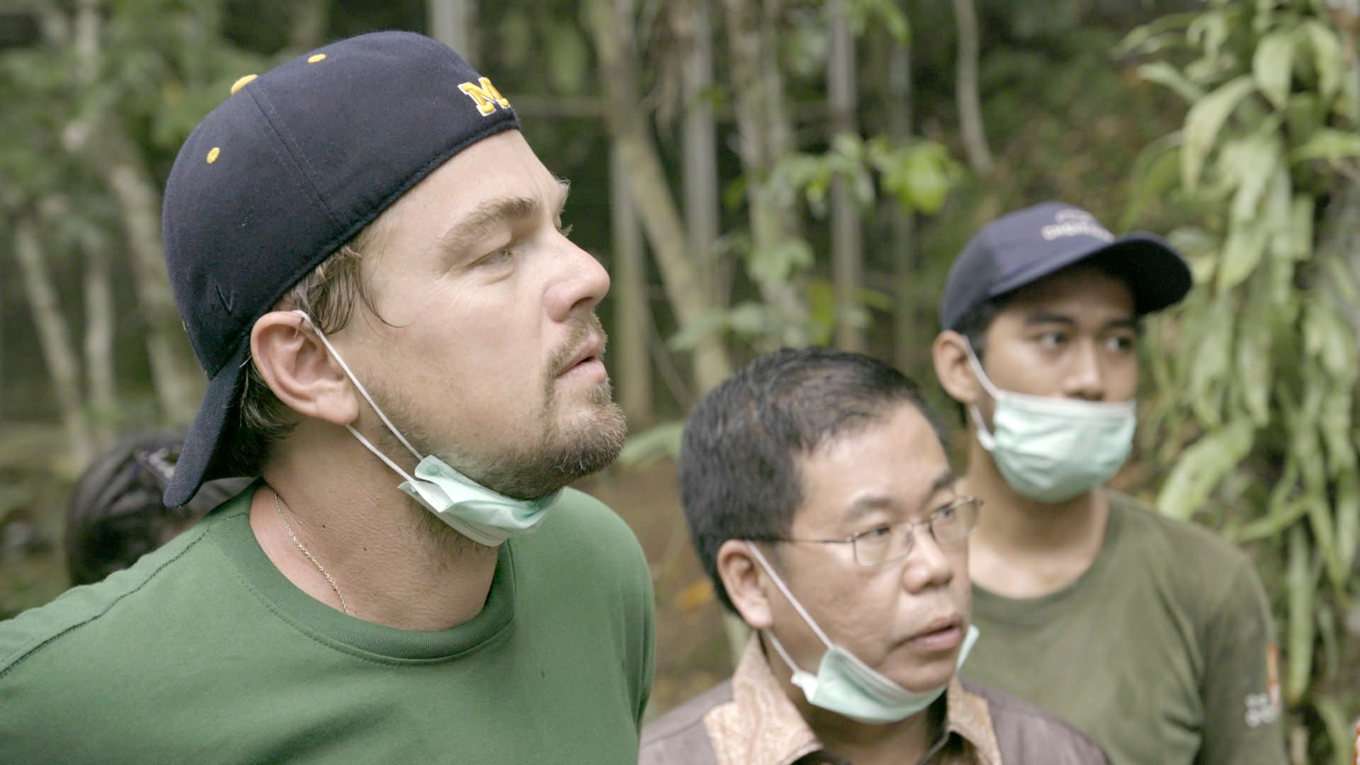 INDONESIA- Leonardo with Orangutans in the Leuser Ecosystem. For two years, Leonardo DiCaprio has criss-crossed the planet in his role as UN messenger of Peace on Climate Change. This film, executive produced by Brett Ratner and Martin Scorsese, follows that journey to find both the crisis points and the solutions to this existential threat to human species. © 2016 RatPac Documentary Films, LLC and Greenhour Corporation, Inc. All rights reserved.