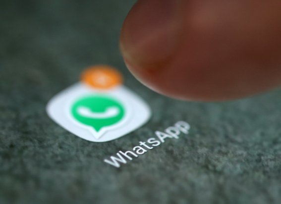 The WhatsApp app logo is seen on a smartphone in this picture illustration taken September 15, 2017. REUTERS/Dado Ruvic/Illustration