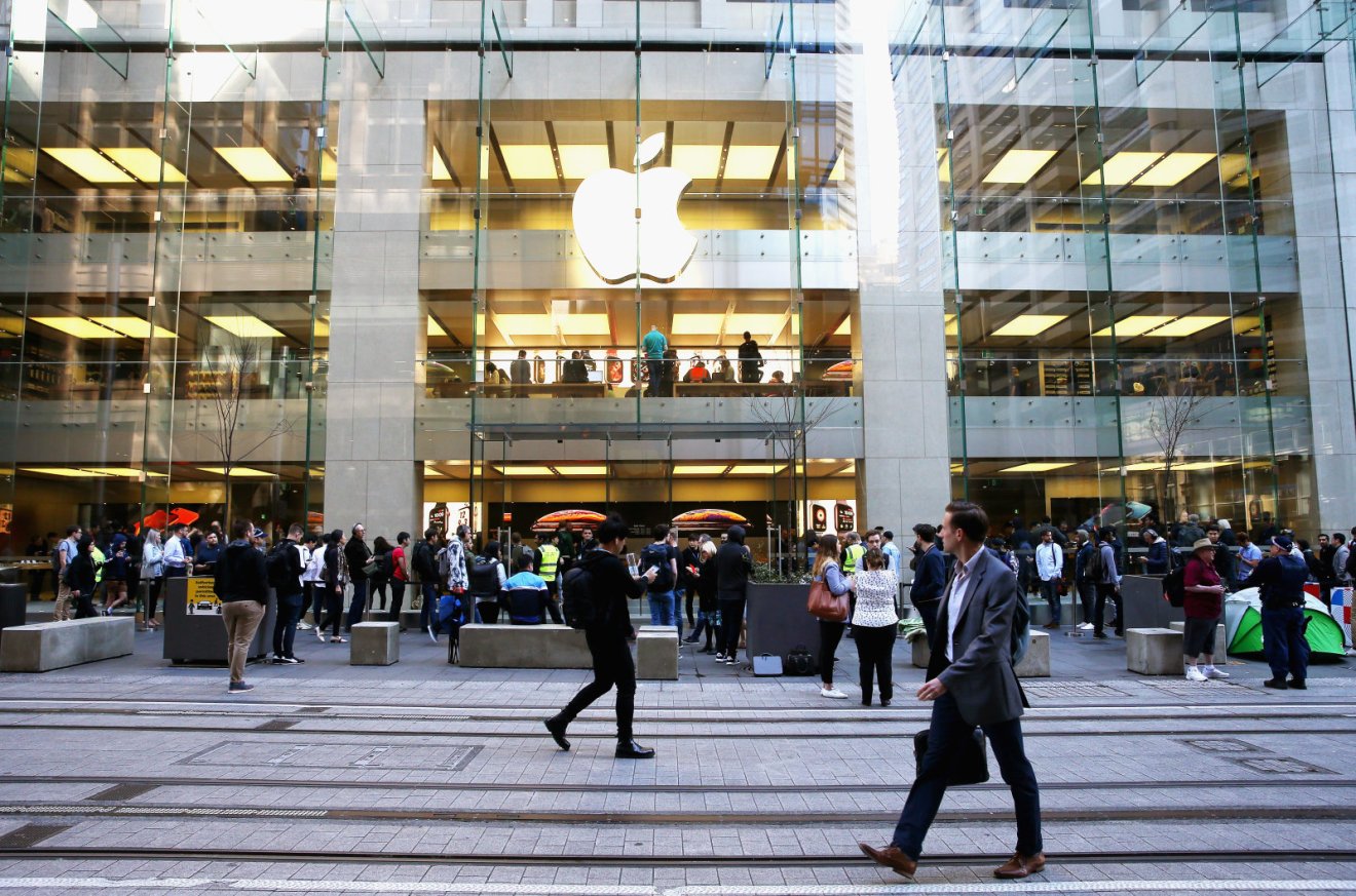 SYDNEY, AUSTRALIA - SEPTEMBER 21:  Crowds wait in anticipation for the Australian release of the latest iPhone models at Apple Store on September 21, 2018 in Sydney, Australia. Apple's latest iPhone Xs and Xs Max features super retina displays with a faster dual camera with photo and video features and the first 7-nanometer chip in a smartphone  - the A12 Bionic chip with next-generation Neural Engine. Apple have also launched the Apple Watch Series 4 which features an improved accelerometer and gyroscope, which are able to detect hard falls, and an electrical heart rate sensor that can take an electrocardiogram (ECG) using the new ECG app.  (Photo by Don Arnold/WireImage)