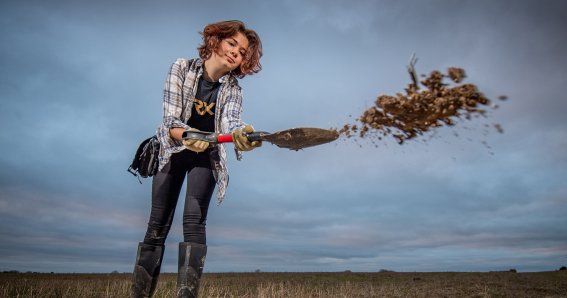 Milly Hardwick,13 with her metal detector out in a field near her home  in Suffolk .See SWNS Cambridge copy SWCAdig:A 13-year-old metal detectorist is scaring off veteran diggers after she found a "once in a lifetime" Bronze Age axe hoard on just her third dig. Milly Hardwick, who's in Year 8 at school, has left the competition envious of her "beginners luck" as she strikes gold almost every week.  She's now become a poster girl for metal detecting despite being some four decades younger than the typical detectorist.