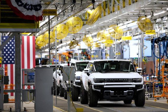 GMC Hummer electric vehicles on the production line at General Motors' Factory ZERO all-electric vehicle assembly plant in Detroit, Michigan, U.S., on Wednesday, Nov. 17, 2021. General Motors invested $2.2 billion in Factory ZERO, the single largest investment in a plant in GM history. Photographer: Emily Elconin/Bloomberg via Getty Images